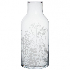 Glass vase decorated with meadow flowers
